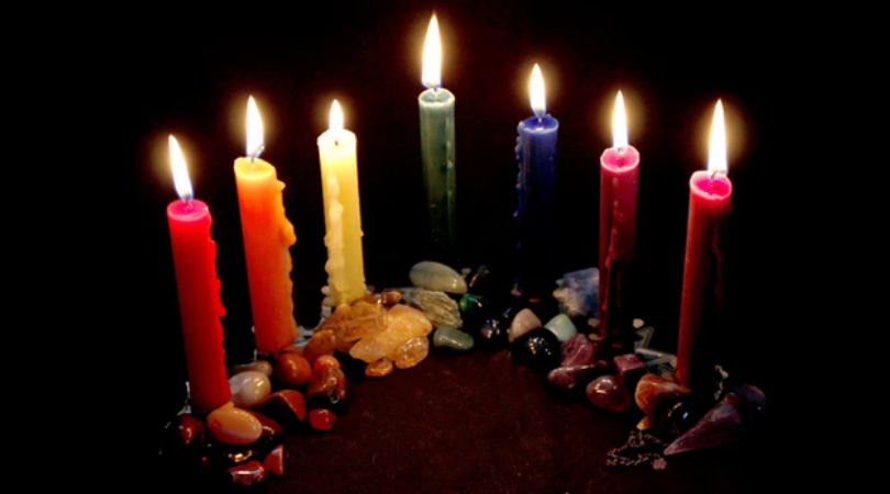 seven Colorful candles for manifesting money with candle magic
